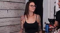 “Hot babe with tattoos”