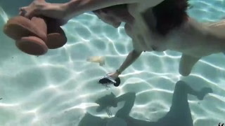 Brunette MILF Sofie Marie Dives In Pool To Play With Dildos